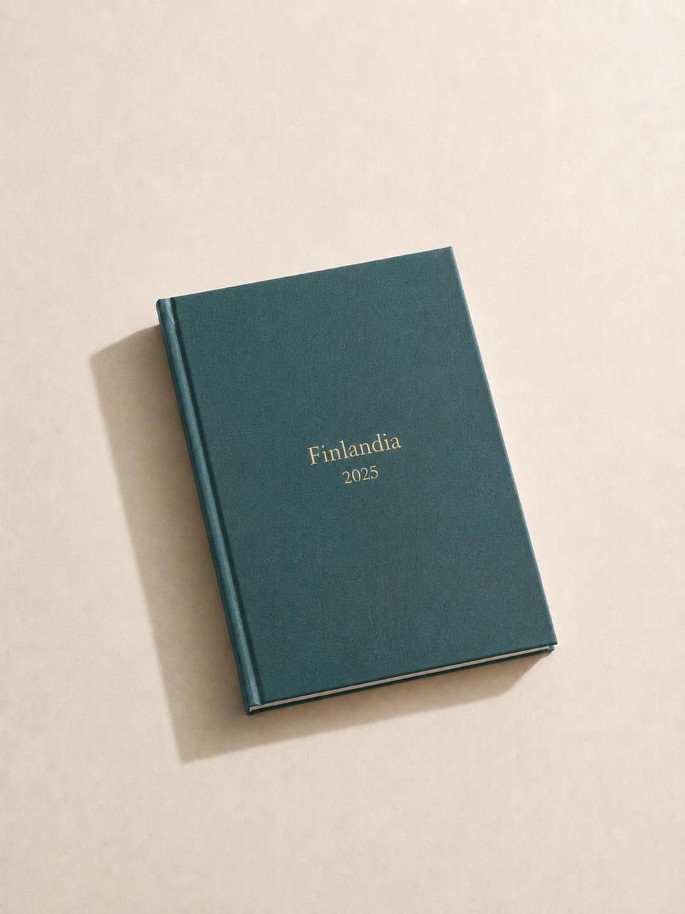 Álbum Aurelle 'Finlandia 2025' en tapa de lino teal con título en dorado